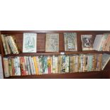 Shelf of children's novels, all with dust wrappers, some First Editions