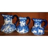 Set of three graduated Flo blue and white Royal Doulton jugs