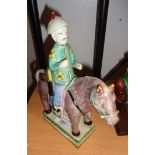 Chinese polychrome glazed pottery figure of a man on a horse