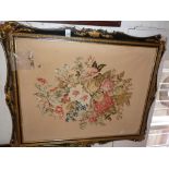 Victorian woolwork picture of flowers in shaped ebonised and gilt frame, 23" x 31"