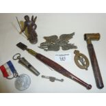 Antique gunpowder measure, glass cutter, cap badge, another badge, old whistle and a small metal