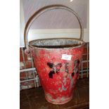 A painted metal "Fire" bucket