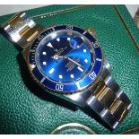 Rolex Submariner Gentleman's bi-metal wrist watch with blue dial, with paperwork, box and