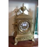 19th c. French ormolu mantle clock having brass dial with enamel numerals