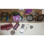 Box containing old coins, magnifier, cigar cutter, WW2 medal etc