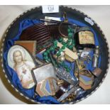 Tin containing assorted ladies vanity items, jewellery, silver button hook, hatpins, badges etc