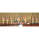 Vintage collection of Irish or Scottish plasterwork figures of girls in a pipe band