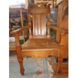 Arts & Crafts ash and elm open armchair with solid seat and panelled back