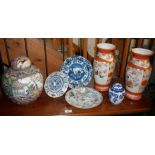 Shelf of Chinese porcelain vases, jars and plates, some A/F