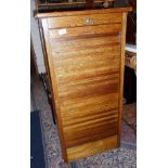 Oak tambour fronted filing or music cabinet