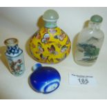 Four Chinese snuff bottles - porcelain and crystal