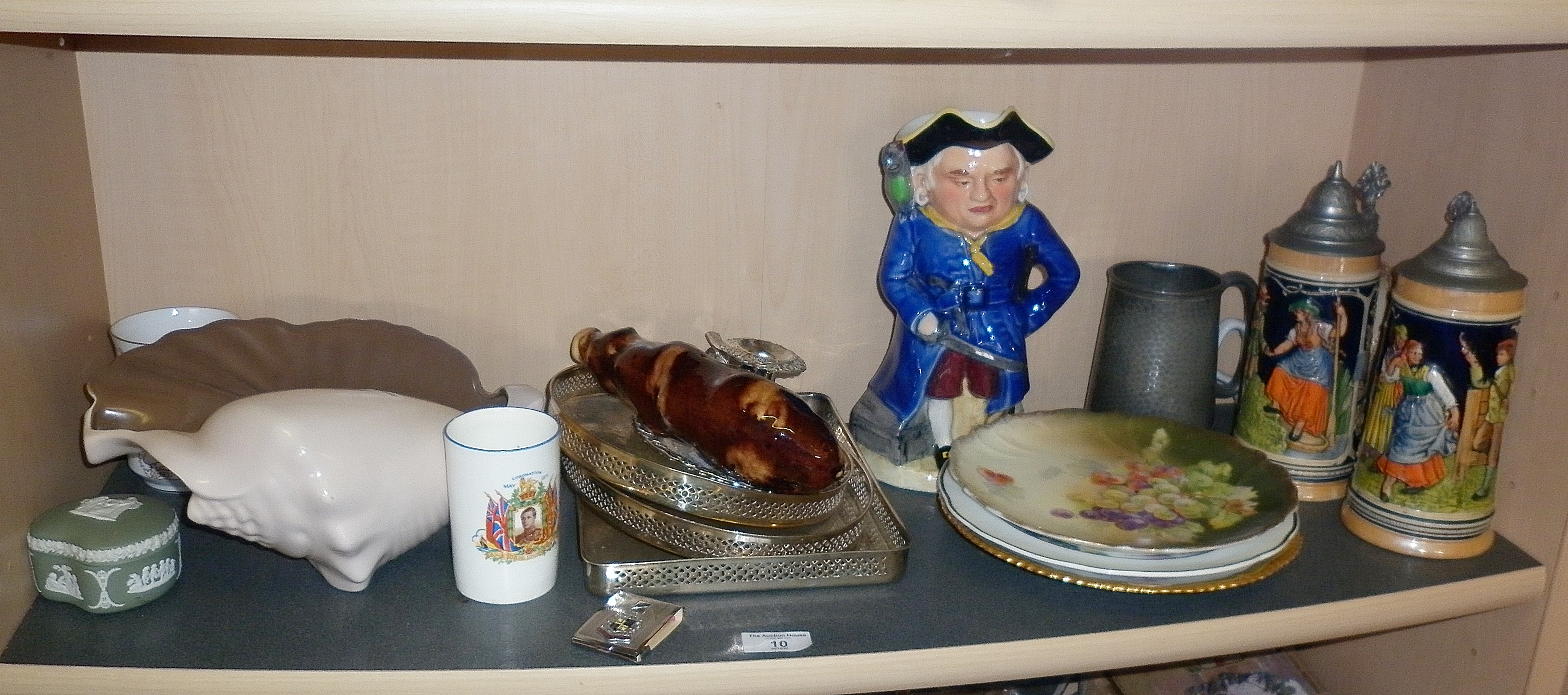 Shelf of assorted china etc. inc. musical Toby Jug Long John Silver, Poole Pottery shell, King