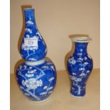 Chinese blue and white double gourd prunus vase with Kangxi mark and another vase