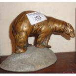 Bronze polar bear figure on granite base