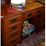 Edwardian mahogany kneehole desk of nine drawers
