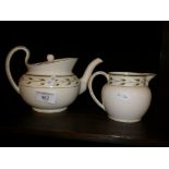 Unusual early 20th c. Wedgwood pearlware teapot and jug with legend under - Manufactured for James