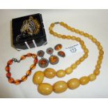 Art Deco butterscotch amber Bakelite beaded necklace, Butler & Wilson tiger brooch, amber and