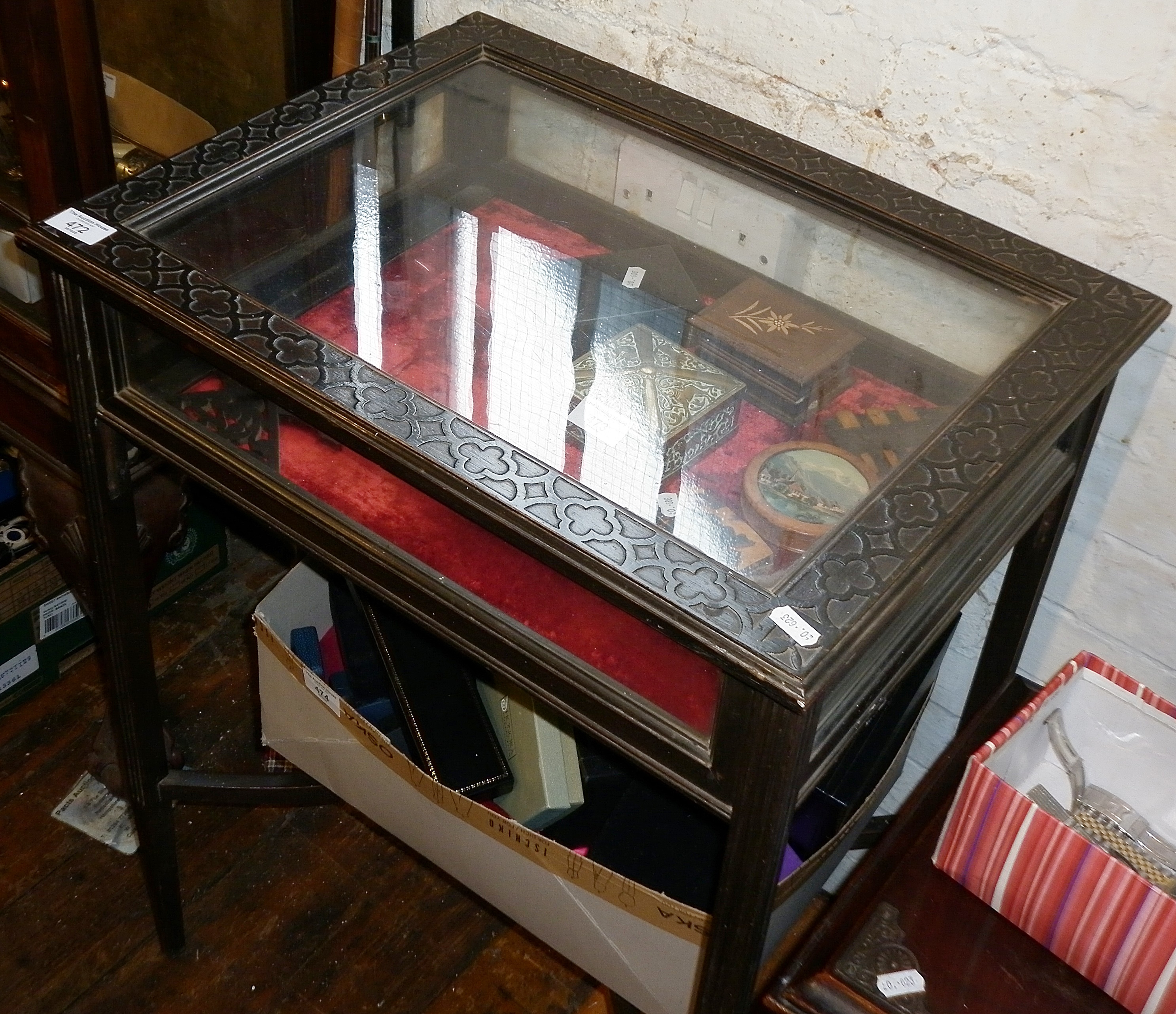 Small Edwardian ebonised and carved bijouterie or vitrine display table