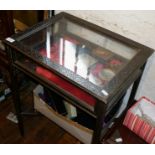 Small Edwardian ebonised and carved bijouterie or vitrine display table