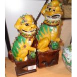Two Chinese porcelain Sancai Fo dogs