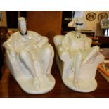 Art Deco style glazed plaster figures of a man and woman sat in armchairs