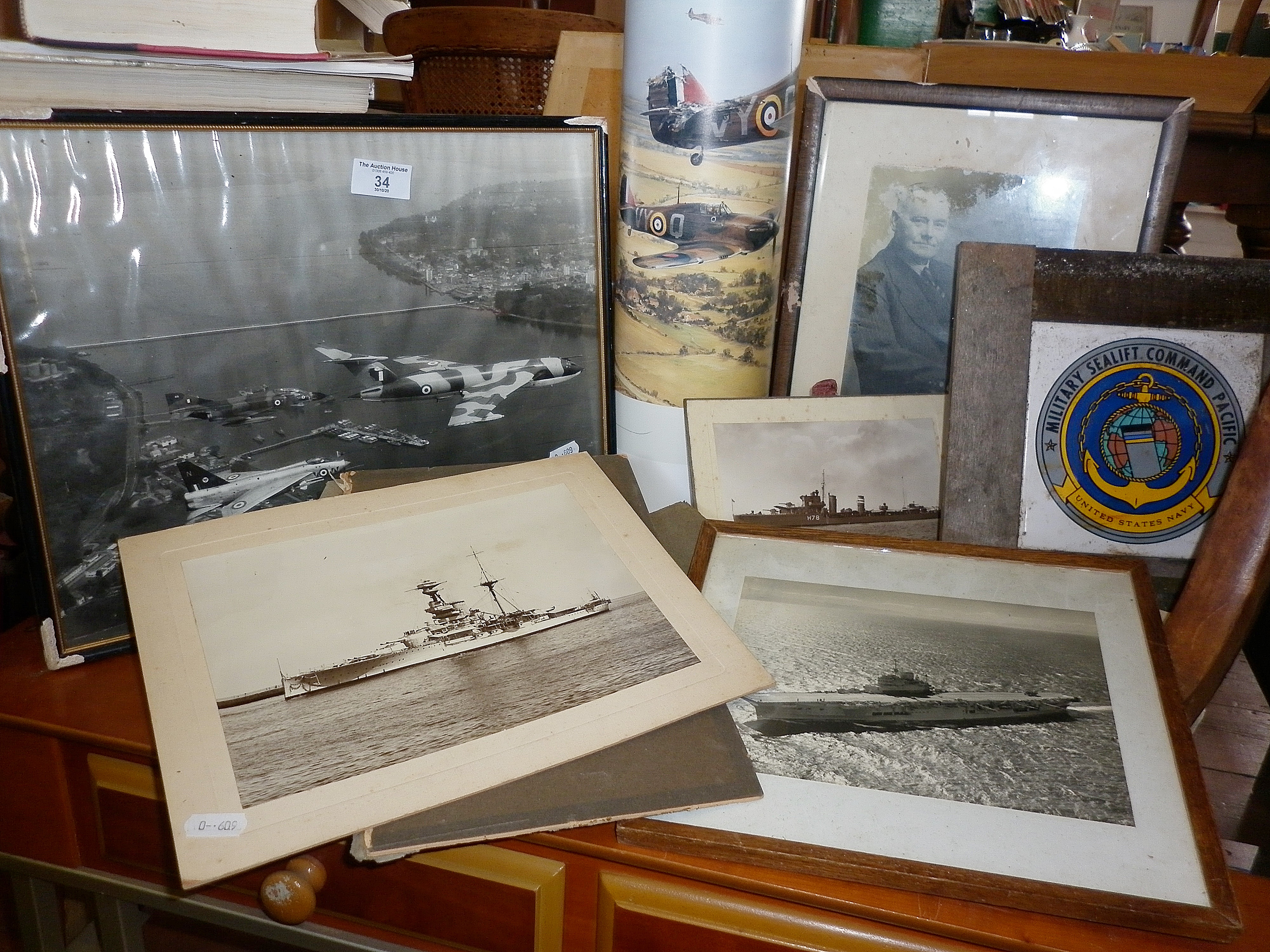 Album of sepia snapshots of liners, ships and people and other photographs including a black and