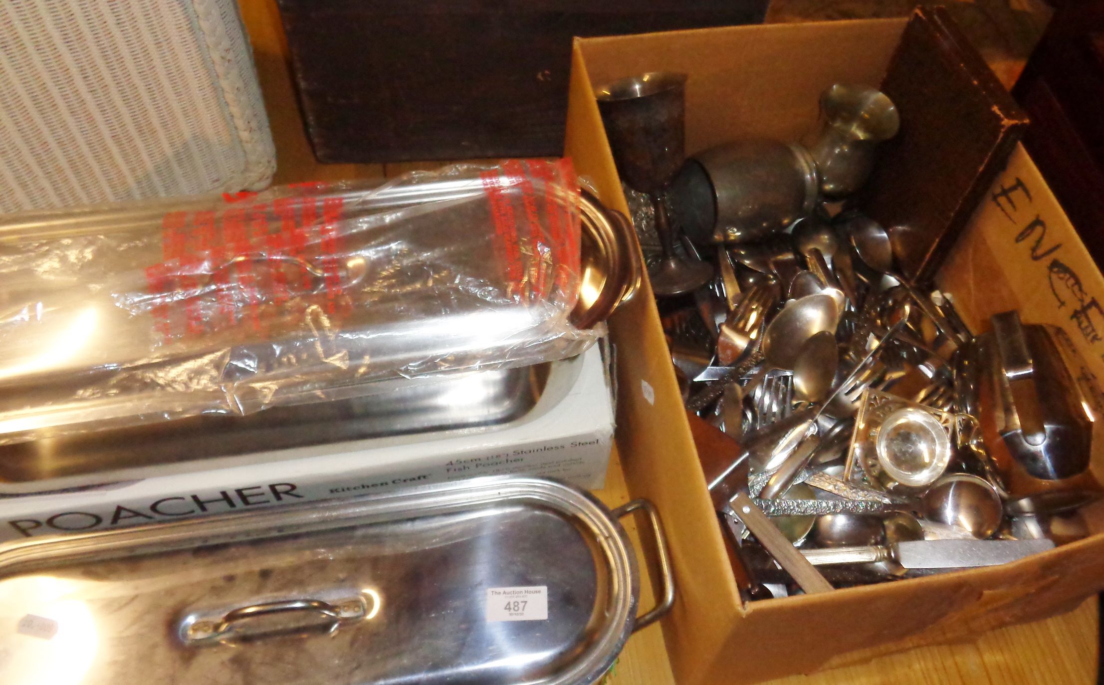 Two stainless steel fish kettles and large quantity of stainless steel cutlery and some cameras