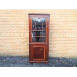 A glazed corner unit measuring approx 20