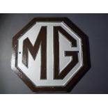 An MG cast iron advertising sign This lo