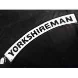 A cast iron sign entitled Yorkshire Man