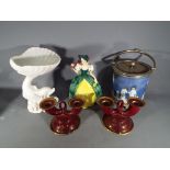 A Goebel lady figurine, two Carlton Ware 'Rouge Royale' candle holders (one A/F),