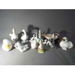 A quantity of ceramic figurines of ducks and geese to include Nao, Beswick,