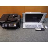A Sony Vaio PCV-W1/G Media Centre personal computer, with mouse and remote and an Epson printer.