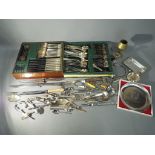 A quantity of plated and stainless flatware, other plated ware,
