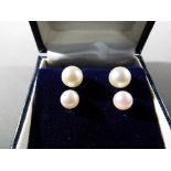 9 ct - two pairs of 9 carat gold and pearl earrings stamped 375 in presentation box