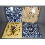 Four ceramic tiles, two by Minton - Hollins & Co.