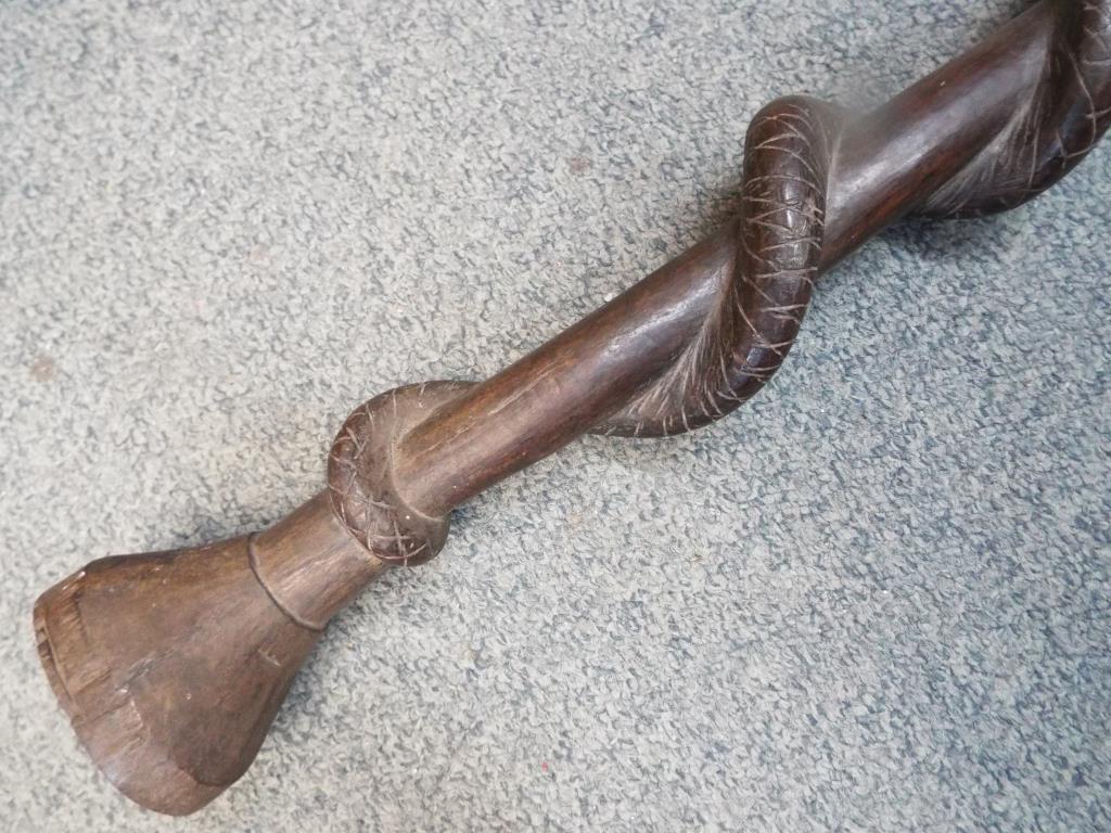 An African hardwood carved tribal staff or totem depicting a snake eating a lizard along the length, - Image 4 of 5