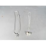 Two lady's silver necklaces