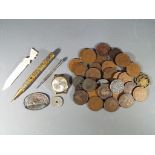 A small collection of pre-decimalisation UK coins,