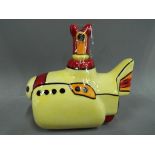 Lorna Bailey - a collectable teapot in the style of a submarine, signed,