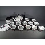 Royal Albert - A Royal Albert part tea service in the 'Masquerade' pattern comprising cups, saucers,