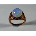 14 ct - a Lady's 14 carat gold an opal ring size K, stamped 14KT, approximate weight 3.