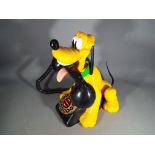 Disney - a Walt Disney novelty phone depicting Pluto by Telemania