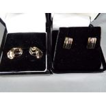 9 ct - a pair of hallmarked 9 carat gold earring in presentation box and a pair of two tone