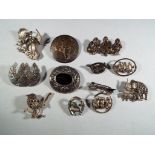 Silver - nine silver hallmarked and European silver brooches,