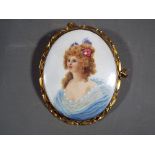 A vintage brooch, stamped 9ct with ceramic plaque decorated with lady in period dress,