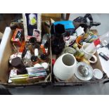 Two boxes containing a mixed lot to include a One Direction collectable doll,