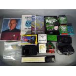 A mixed lot of collectables to include a Casio TV-600 LCD colour television, card trick set,