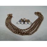 9 ct - a 9 carat gold diamond cut curb chain, approximate length 48 cm including clasp,