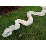 A life size model of a python, approximately 260 cm (l) figure is hollow and of man-made material,